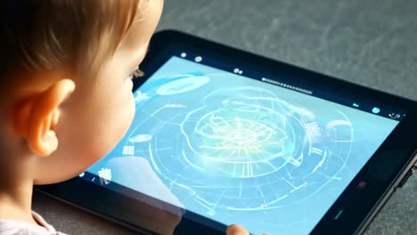 child interacting with tablet