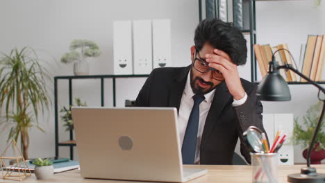 business man working on laptop loses becoming surprised sudden lottery results bad news fortune loss