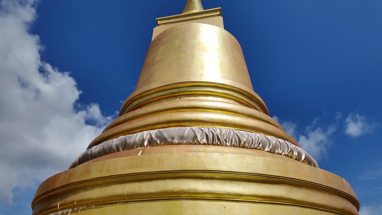 Buddha temple pagoda golden color plated Chedi Wat Khao Hua Chuk Thailand buddhist religion