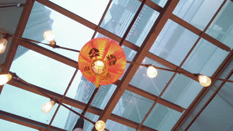 Beautiful-Round-Red-Lantern-Hanging-As-Decoration---Concept-Of-Chinese-Lunar-New-Year-Festival---low-angle-shot