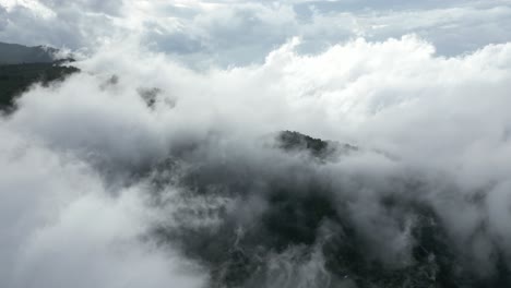 Wispy-clouds-above-the-mountains-in-Bali,-Indonesia