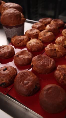 various types of baked bread on a tray