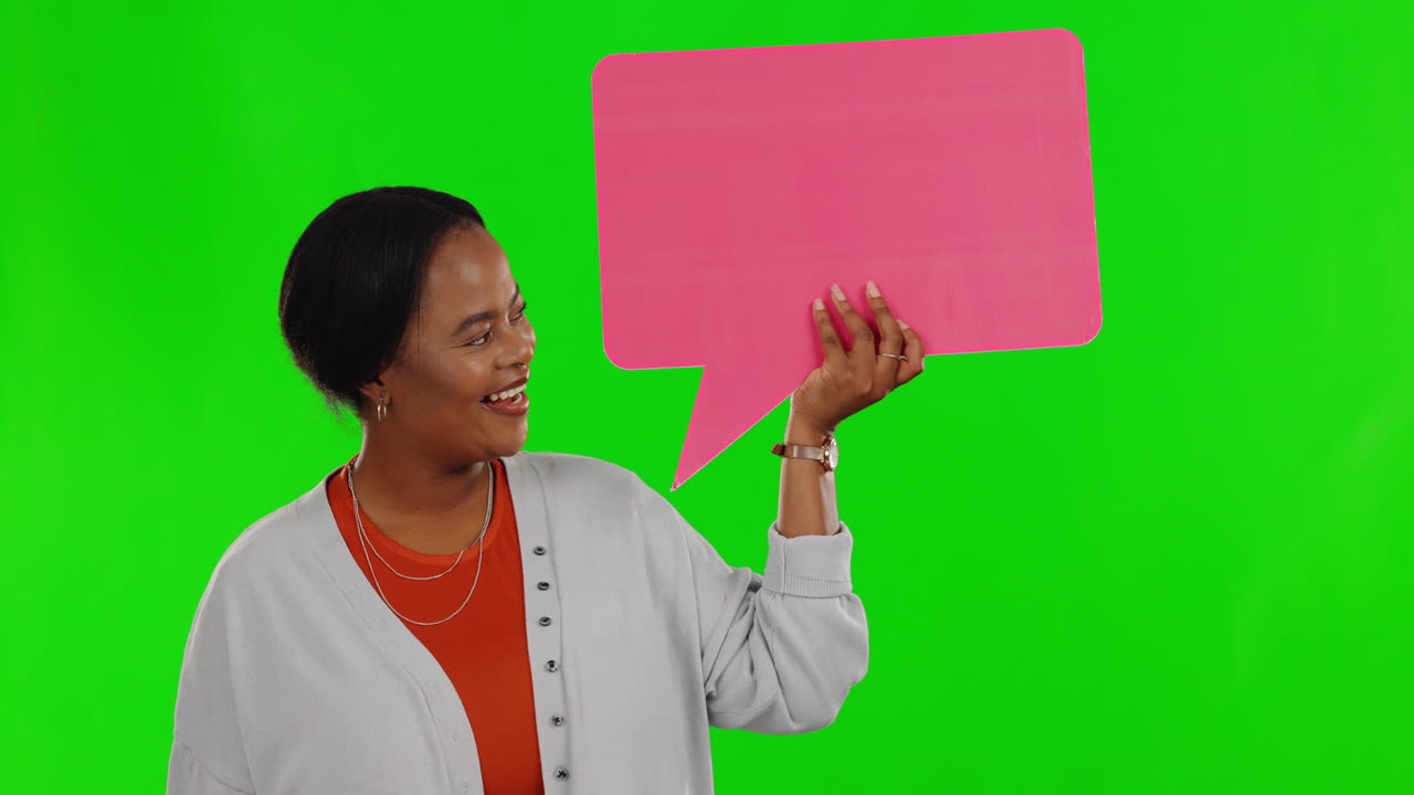 Woman Holding a Pink Speech Bubble