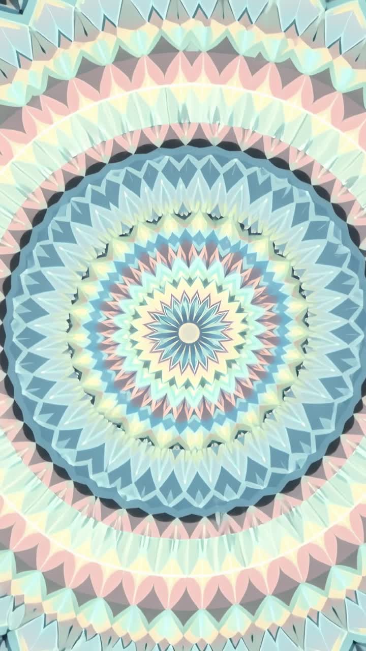 Video verticale: Animazione iniziale che mostra un mandala che ruota e pulsa su un display verticale, con colori pastello.
