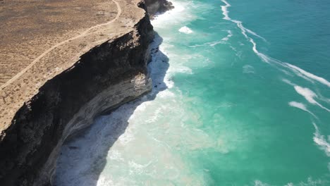 Drone-aerial-moving-forward-and-panning-over-the-Great-Australian-Bight-with-crashing-waves