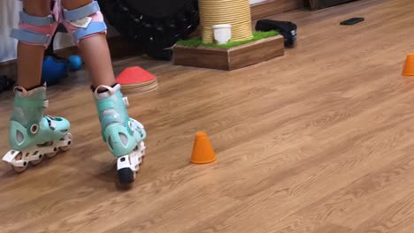 children learning to roller skate