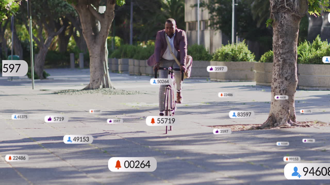 Animazione di icone di social media su un uomo afroamericano in bicicletta per strada