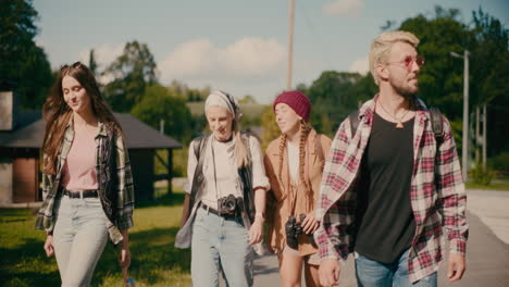 Young-Male-And-Female-Tourists-Exploring-During-Vacation