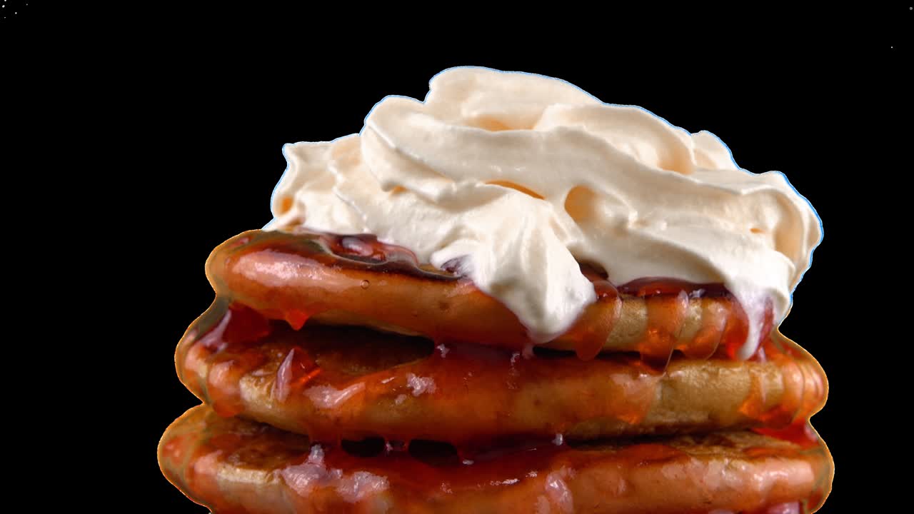 American pancakes with strawberry topping and whipped cream. Alpha channel included.