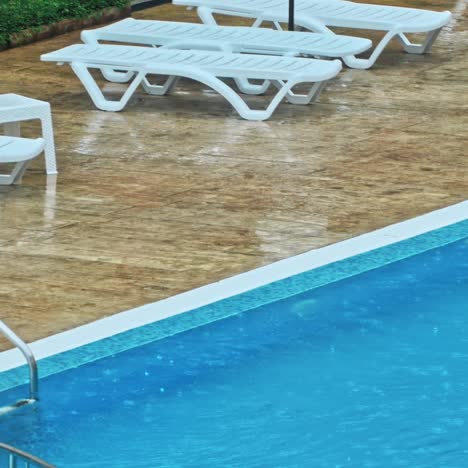 woman relaxing in swimming pool.