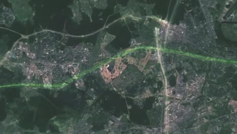 aerial view of a city with roads and highways