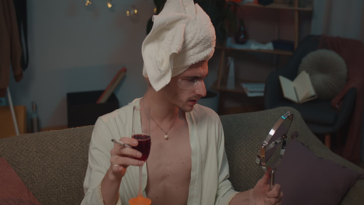 Man relaxing with wine and self-care routine