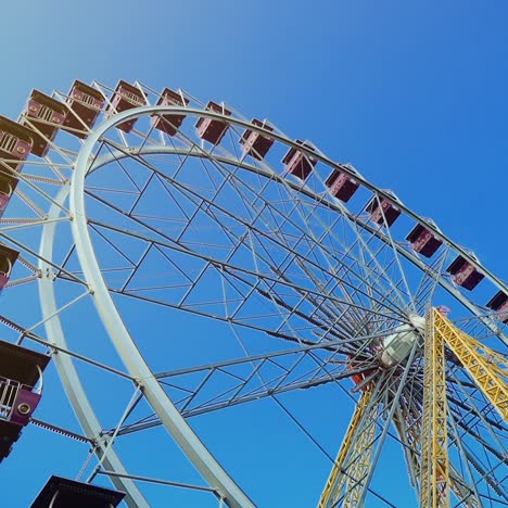 large ferris wheel on a blue sky.