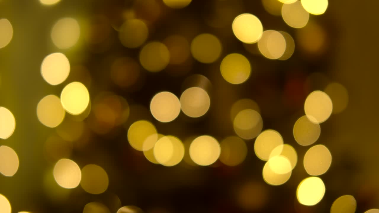 imágenes de fondo borrosas de luces amarillas durante las vacaciones de invierno