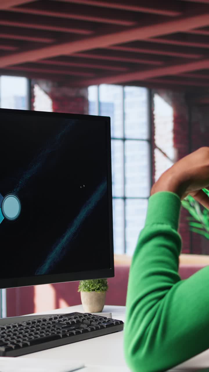 Vertical Video Teleworker in home office watching business conference on PC