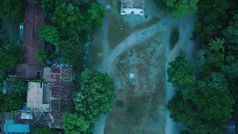 Aerial-Top-Down-Drone-View-of-beach-town-Trancoso-in-Bahia-Brazil-with-rooftops-and-Quadrado