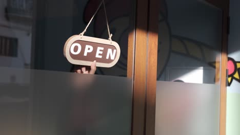 small business closing up. turning the sign from open to closed. 4k 60fps