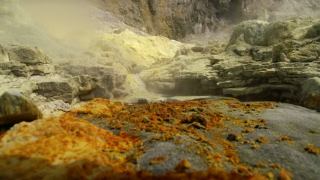 yellow mineral sulfur vent in volcanic crater, whakaari white island