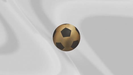 animación de una pelota de fútbol sobre un fondo gris con olas