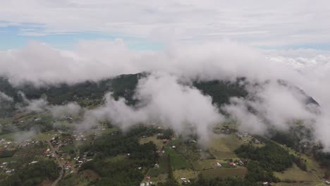 discover breathtaking views of villages nestled between clouds from a drone’s eye.