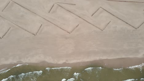 Bird's-eye-view-and-spin-over-rough-crashing-waves-on-lake-Michigan