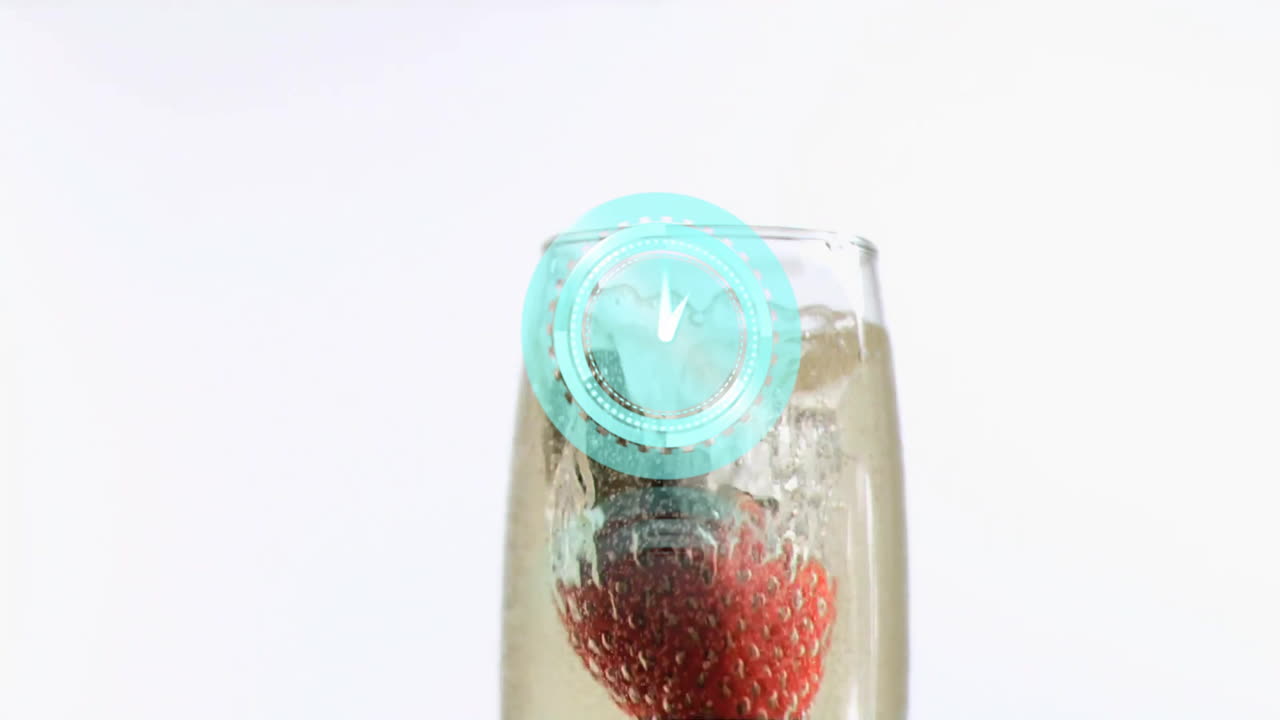 Floating strawberry in champagne glass with circular animation overlay