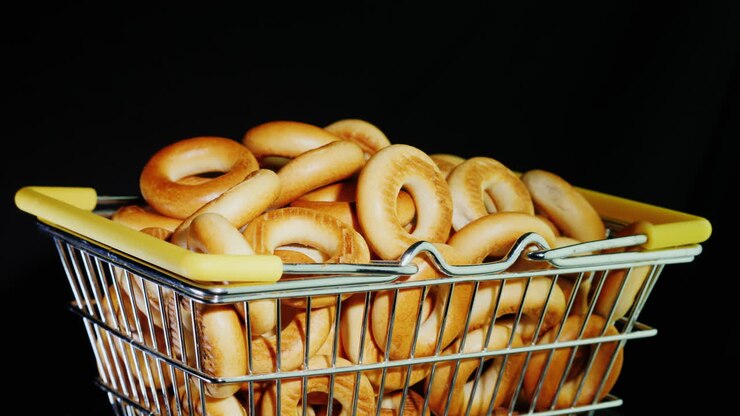 Small Bagels In A Shopping Trolley In Miniature 4k Video