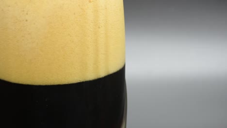 detail of a pint of black beer