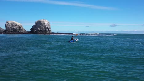 surfing-in-punta-de-lobos-chile-sunny-day-incredible-landscape-recorded-with-drone-and-kayak-fishing