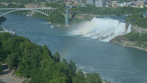 Shot-above-the-American-Falls-and-the-Rainbow-bridge,-the-border-of-Canada-and-the-USA