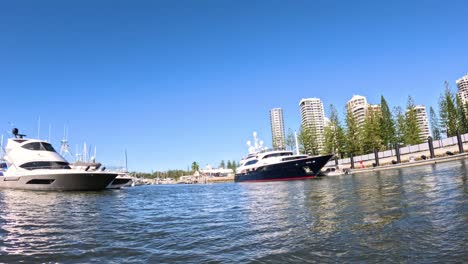 yachts and sailboats docked in gold coast harbor