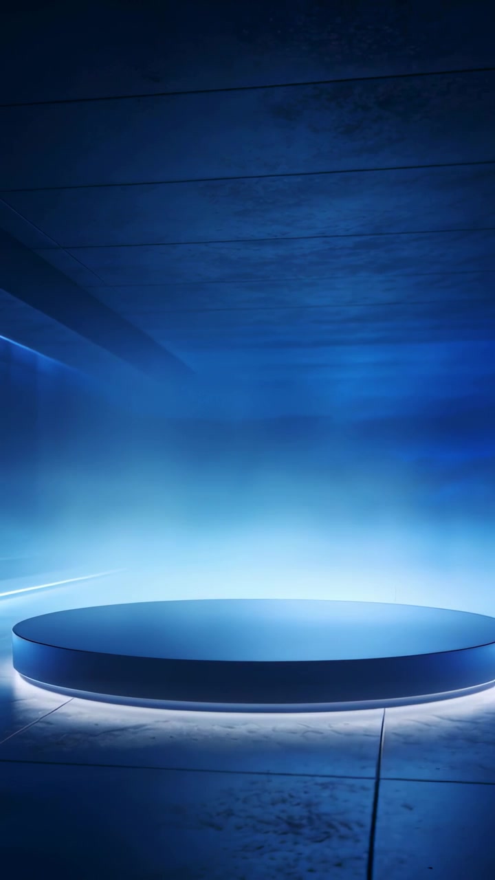 Vertical video: Brightening rim LED, circular platform pulsing at stage, creating halo haze