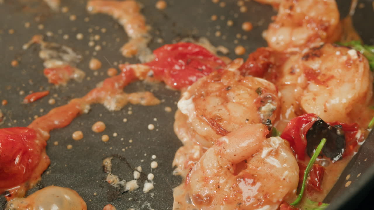 Cooking Shrimp with Tomatoes and Sauce in a Pan