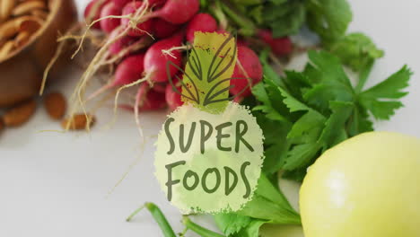 Super Foods text animation over fresh vegetables including radishes and parsley
