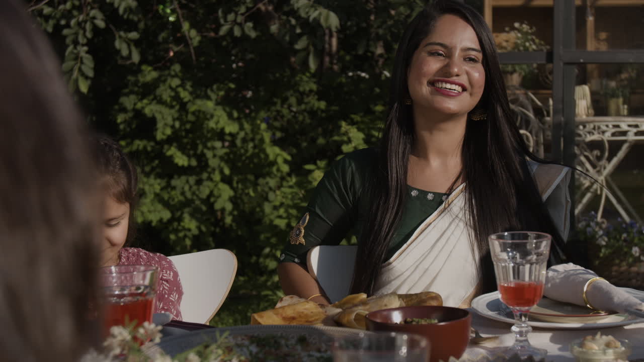 Mother and Daughter Dining Outdoors