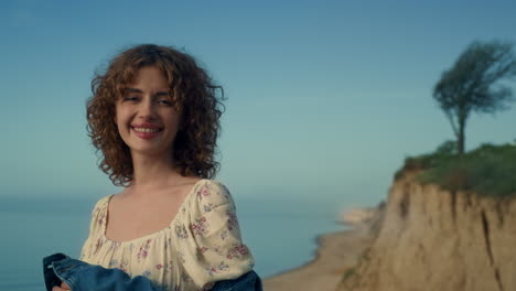 portrait happy lady smiling on beautiful beach. attractive girl looking camera.