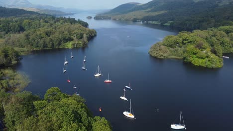 drone footage showing coniston lake in the lake district, cumbria, uk and looking north from the south of the lake