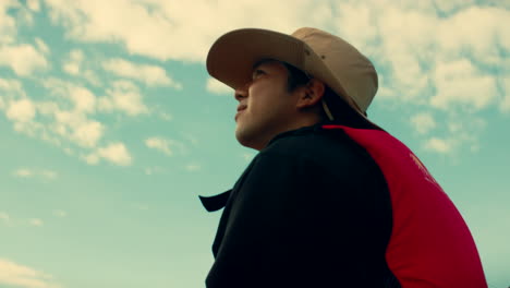 man hiking with a life vest