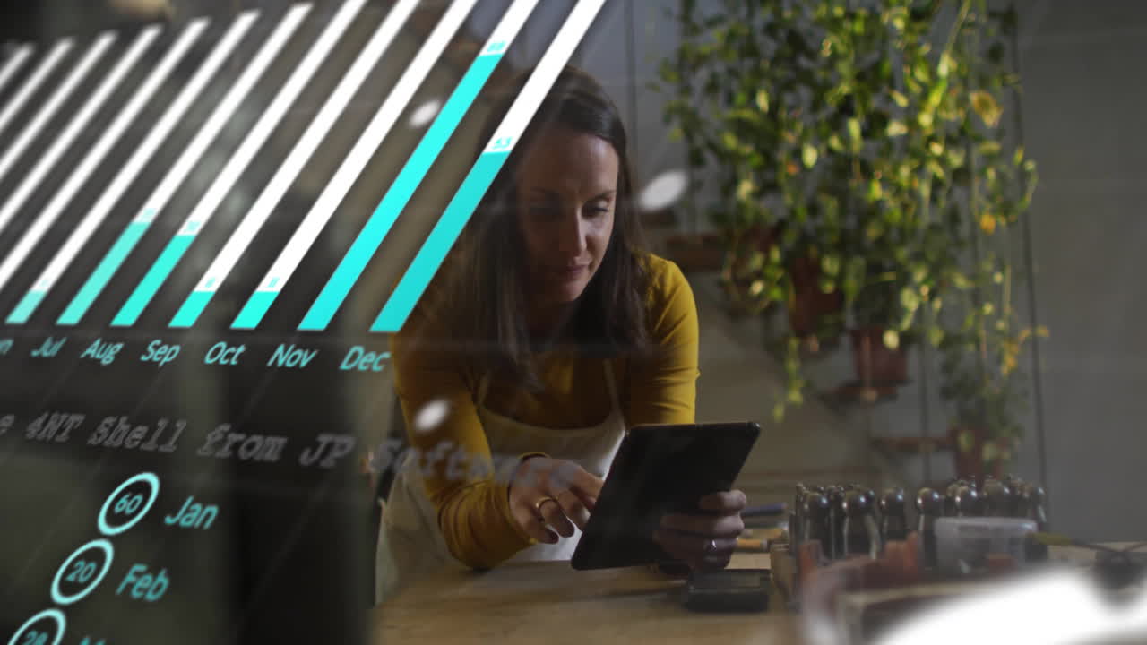 Animation of data processing over biracial businesswoman using tablet in office