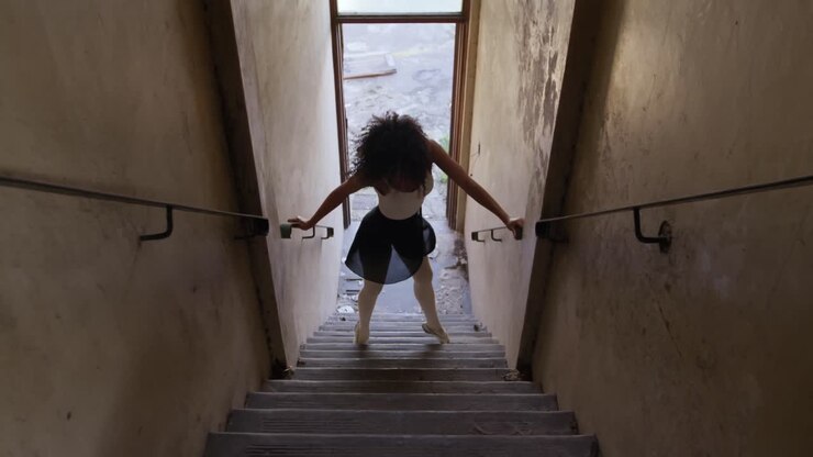 Female dancer in an empty warehouse