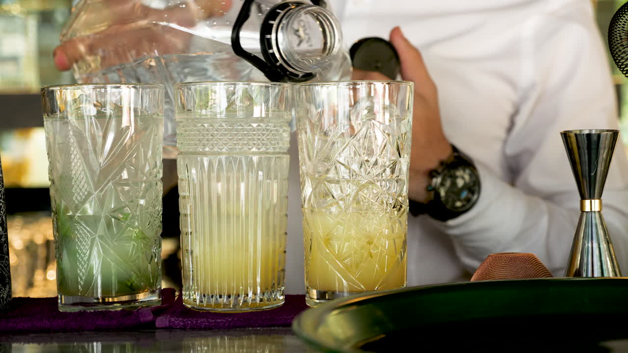 Cocktails being prepared at a bar