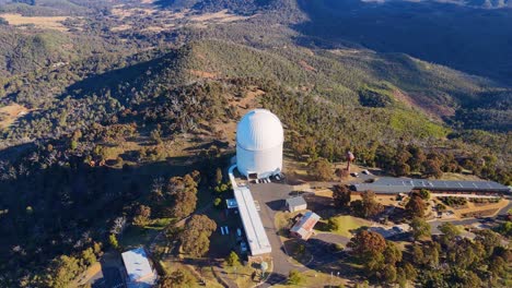 drone captures observatory and telescopes amid scenic natural landscape