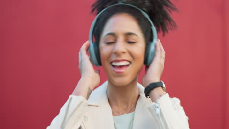 happy woman with headphones listening to music
