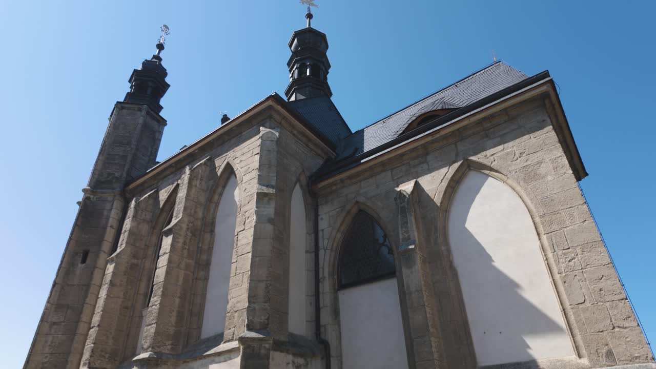 Exterior of Sedlec Ossuary in Kutná Hora, Czech Republic, featuring Gothic architecture and stone details