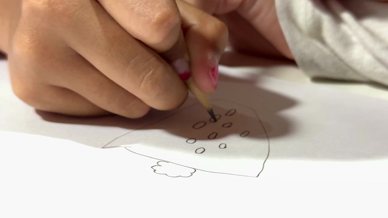 hand drawing sketch with pencil, artistic illustration on paper, kids creativity and drawing concept.