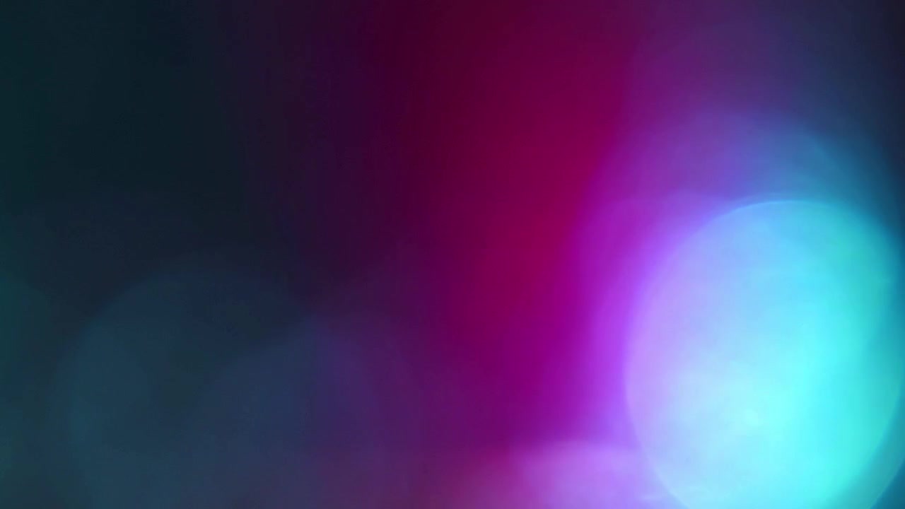 Abstract Light Leaks and Bokeh Effects in Teal and Purple