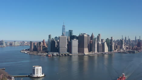 an aerial view of new york harbor on a sunny day with clear blue skies