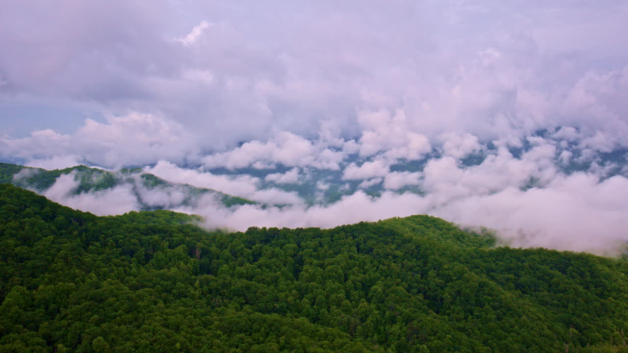 Mist-covered ridges in a cinematic drone capture.