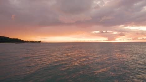 Drone-Flight-Over-Notable-Surfing-Spot-In-The-North-Shore-Of-Oahu-In-Hawaii-On-A-Dramatic-Sunset