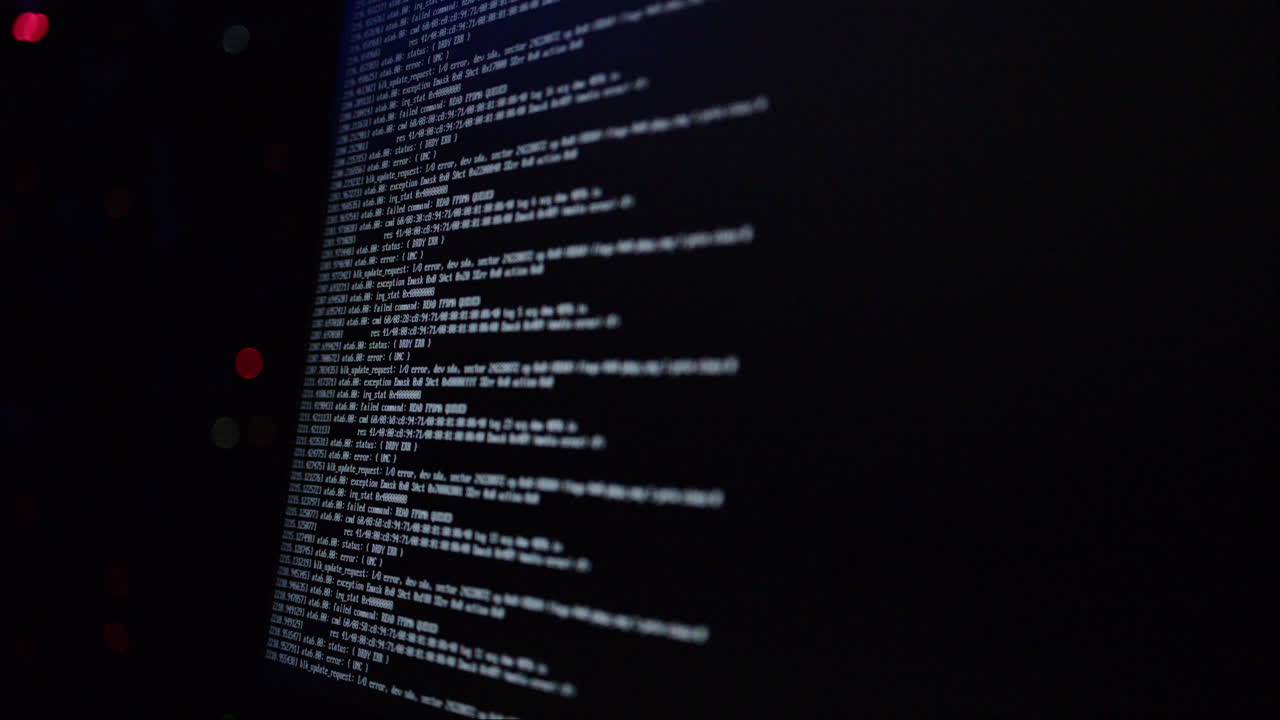 Close up of code on a screen in a server room